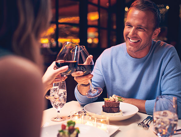 Couple dining with wine